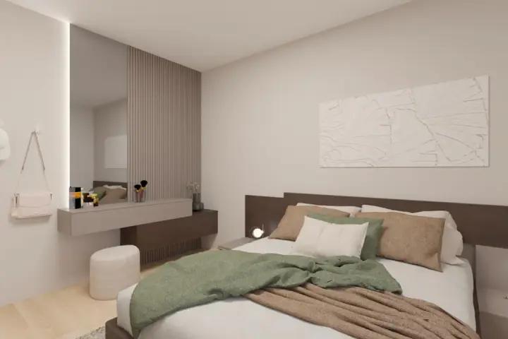 Camera da letto con idee originali: letto accogliente, specchio a parete, toeletta con cosmetici e appendiabiti.