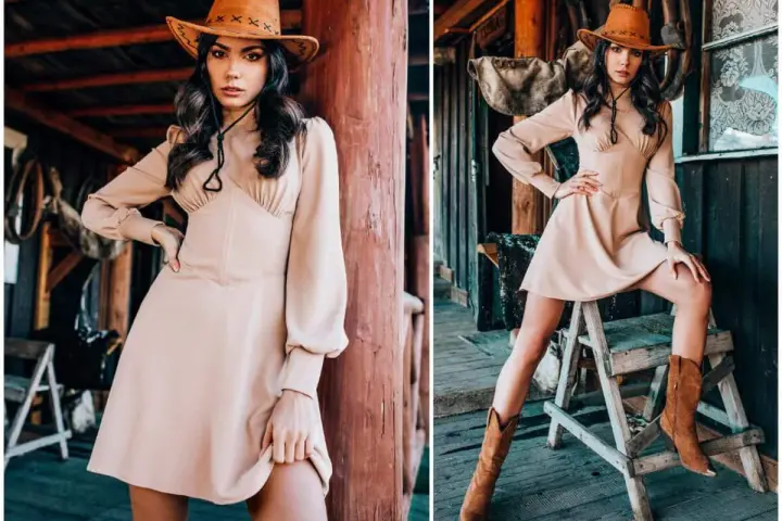 Kobieta w kapeluszu kowbojskim i beżowej sukience prezentuje stylizacje w stylu country. Uzupełniają je brązowe kowbojki.