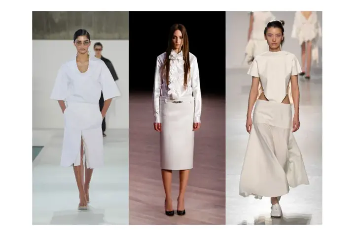 Sfilata di moda con tre modelle che indossano abiti eleganti in **dress code total white**. Gonne lunghe e top asimmetrici.
