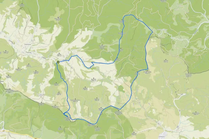Trasa rowerowa przez **szczawnickie góry**, z widokiem na szczyty takie jak Durbaszka i Jaworzyna.
