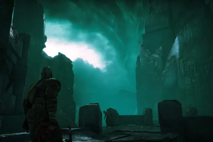 Kratos se adentra en Helheim, el reino de los muertos de God of War, bajo un cielo verde espectral.