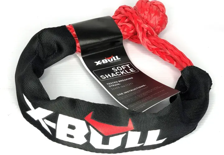 Czerwona, miękka szekla X-BULL z czarnym oplotem i białym logo, gotowa do akcji.