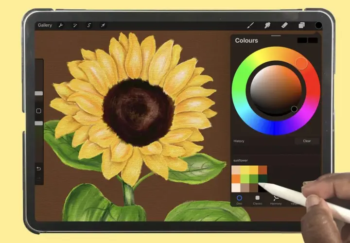 Mit einem Stift auf dem iPad malen: Ein Sonnenblumenbild entsteht mit lebendigen Farben und Texturen.
