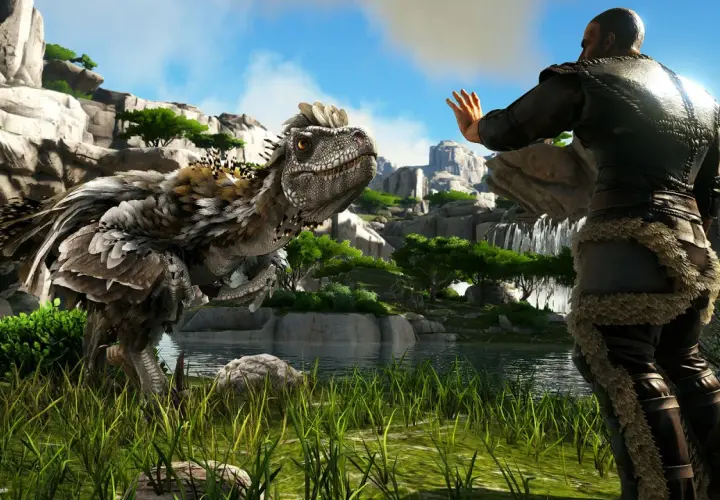Człowiek w futrzanych strojach wita się z pierzastym dinozaurem. Premiera ark 2.