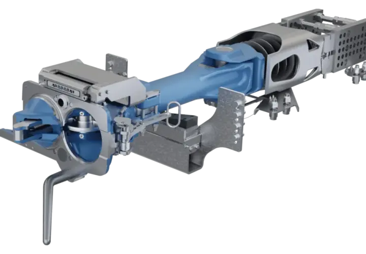 Mechanizm sprzęgła samoczynnego z niebieskimi elementami i metalowymi częściami, pokazujący jego wewnętrzną budowę.