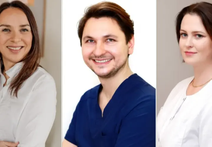 Trzy uśmiechnięte osoby: kobieta w białej koszuli, mężczyzna w granatowym mundurku, kobieta w białej bluzce.