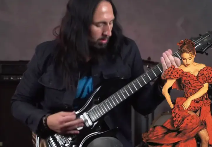 Mężczyzna gra na gitarze, a obok niego tańczy kobieta w czerwonej sukni. To jakby muzyka z "la isla bonita" ożyła.