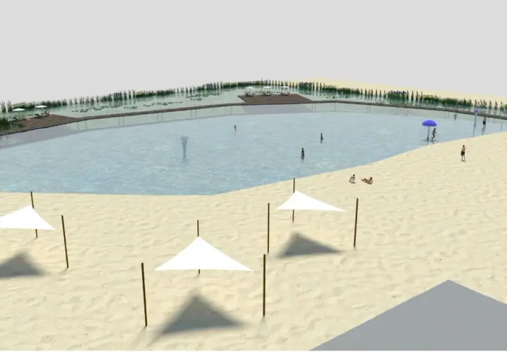 Relaks nad zalewem Cieszanowice: piaszczysta plaża, wodne atrakcje i wypoczynek pod białymi parasolami.