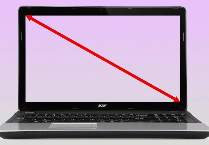 Czerwona linia pokazuje, jak sprawdzić ile cali ma laptop, mierząc po przekątnej ekranu.