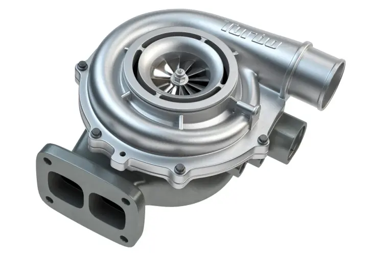 Metalowa turbosprężarka z widocznym wirnikiem i napisem "TURBO". Zastanawiasz się, ile koni daje turbosprężarka?