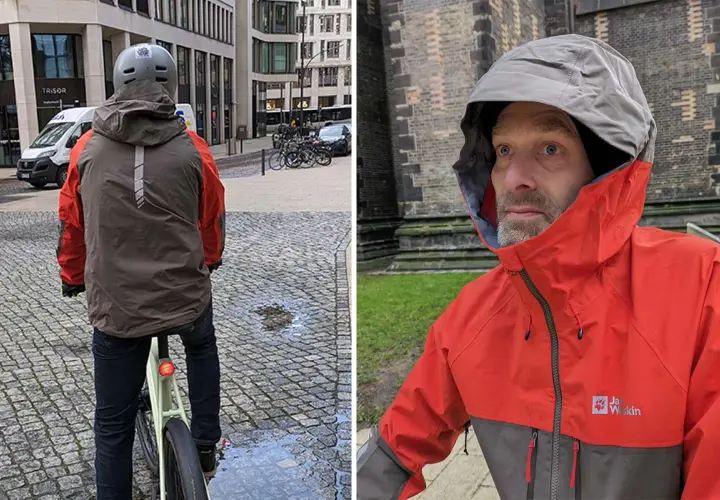 Mann im roten und grauen Regenjacke trockner, bereit für die Fahrt.