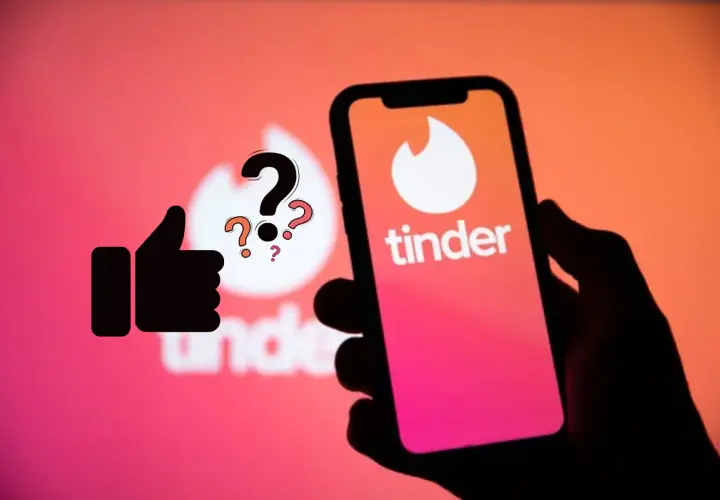 Kciuk w górę i znaki zapytania nad logo Tindera. Zastanawiasz się, tinder ile lajków dziennie?