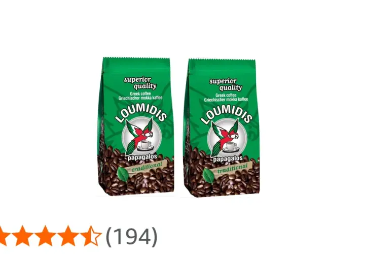 Zwei Packungen Loumidis Kaffee mit Papageien-Logo und Kaffeebohnen. "Superior quality" und "traditional" sind auf den Packungen zu sehen.