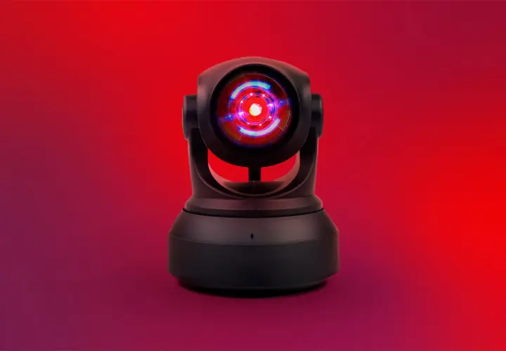 Cámara de seguridad Wesco Anixter con lente rojo brillante, lista para vigilar.
