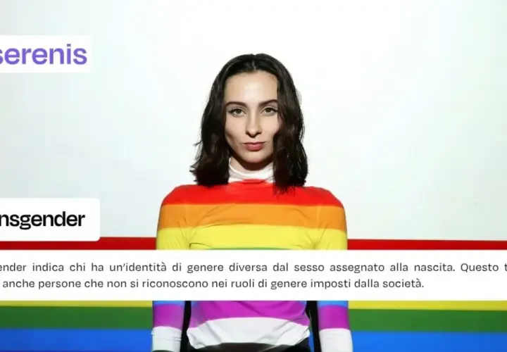Ragazza con maglia arcobaleno, simbolo di transizione di genere e inclusione.