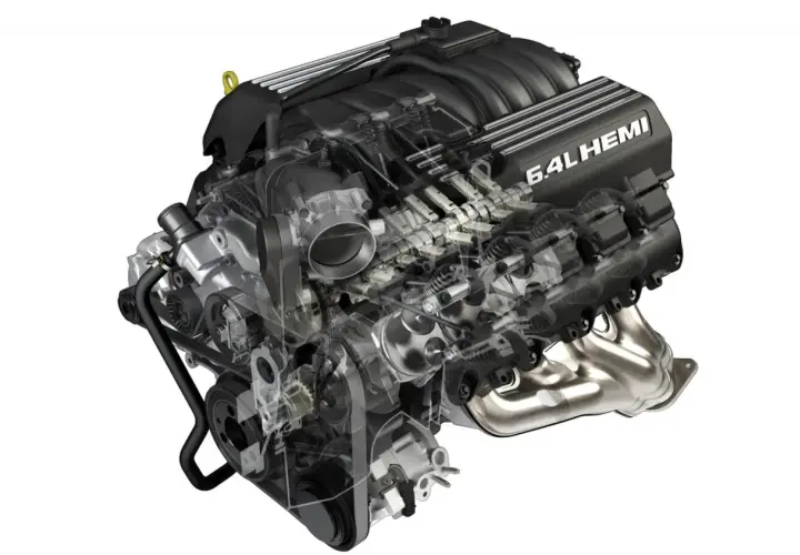 Silnik 6.4L HEMI, serce potężnego Hellcata, ukazany w przekroju, z widocznymi elementami układu rozrządu i dolotowego.