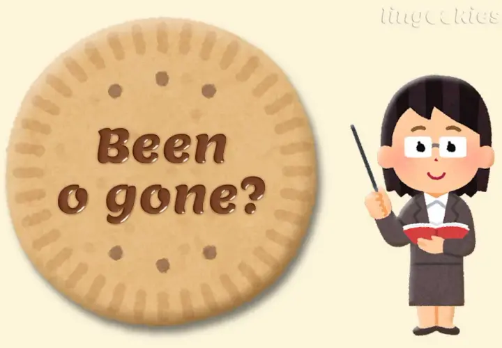 Biscotto con "Been o gone?" scritto in cioccolato, con una maestra che indica. Esempi di "been" e "gone" per imparare l'inglese.