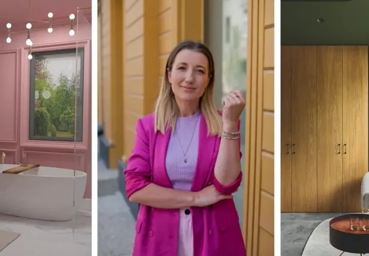 Różowe kolory ścian w łazience, kobieta w fuksjowej marynarce i nowoczesne wnętrze z drewnianymi panelami.