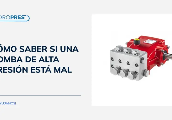 Bomba de alta presión roja y plateada, esencial para hidrolimpiadoras. Aprende a detectar fallos.
