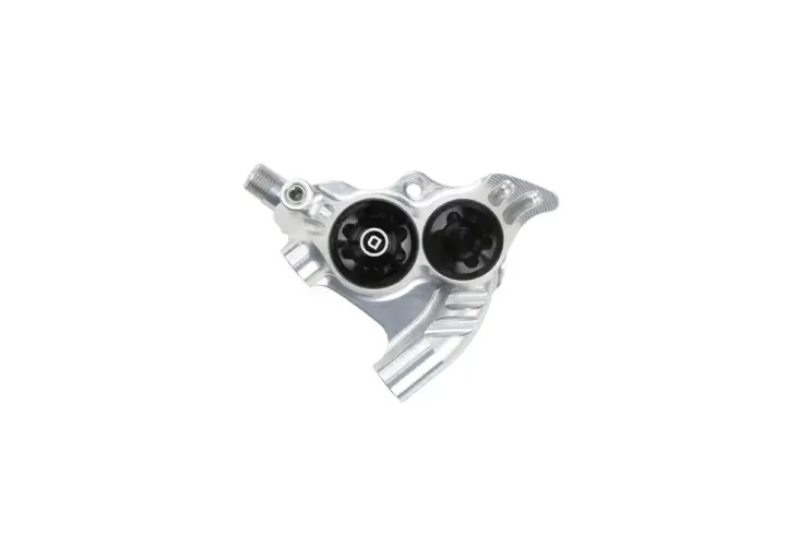 A silver Hope RX4 brake caliper with two black pistons, ready for powerful braking on any trail.