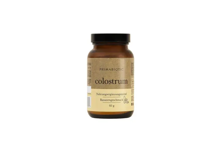 Braunes Glas mit Primabiotic Colostrum, Nahrungsergänzungsmittel mit Bananengeschmack, 60g.