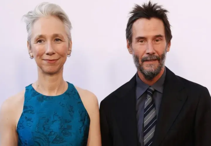 Keanu Reeves z żoną Alexandrą Grant na czerwonym dywanie.