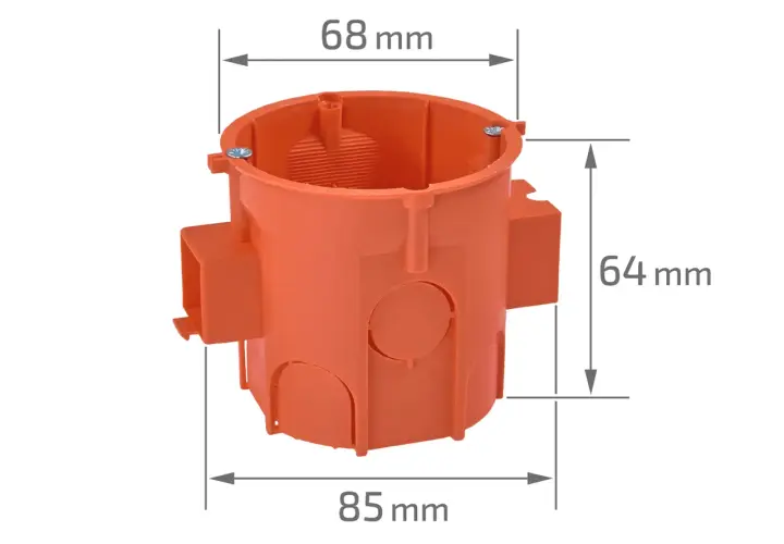 Pomarańczowa puszka elektryczna z zaznaczonymi wymiarami: średnica 68 mm, wysokość 64 mm, szerokość 85 mm.