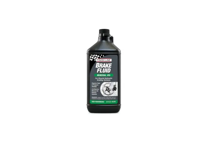 Finish Line Brake Fluid bottle, mineral oil for hydraulic systems. Its viscosity ensures superior heat and pressure stability for reliable braking.