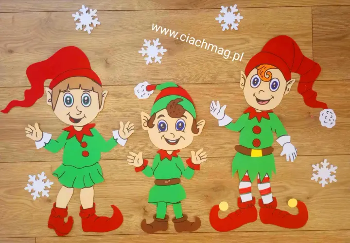 Trzy uśmiechnięte elfy w zielonych strojach i czerwonych czapkach, gotowe do świątecznych przygotowań. Jak zrobić elfa?