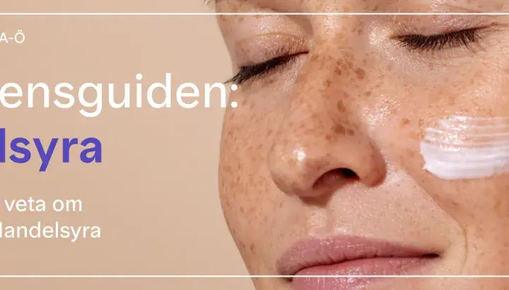 En närbild på en kvinna med fräknar som applicerar kräm. Texten lyder "Ingrediensguiden: Mandelsyra. Allt du behöver veta om ingrediensen Mandelsyra.