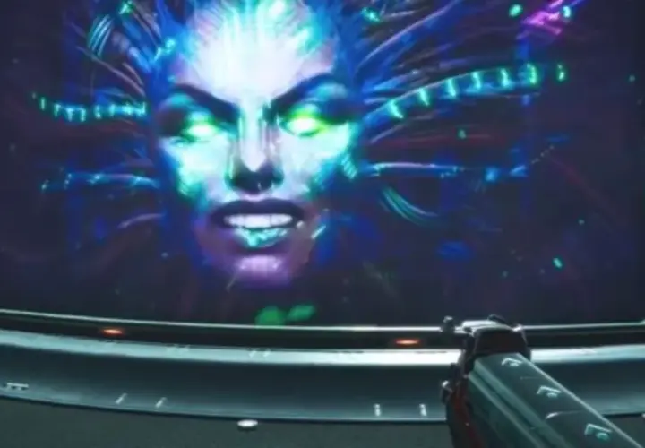 Złowroga twarz SHODAN na ekranie, otoczona neonowymi kablami, zapowiada kolejne wyzwania w System Shock 3.
