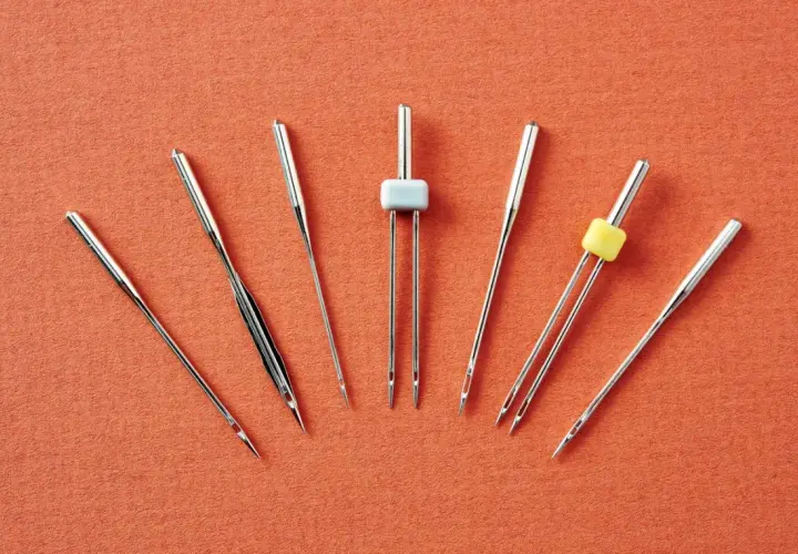 Sewing machine needles vary in size and design. Are all sewing machine needles the same? No, this image shows several different types.