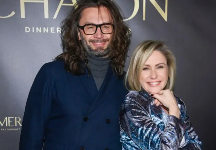 Małgorzata Ohme z partnerem na tle napisu "CHATEAU DINNER".