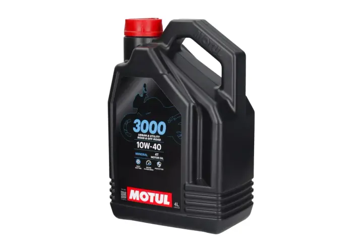 Czarna, plastikowa bańka oleju silnikowego Motul 3000 10W-40 z czerwoną zakrętką.