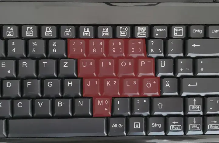 Die Tastatur zeigt, dass die Zahlenreihe und die Tasten mit den Zahlen 1-6 rot markiert sind. Die Tastatur zahlen gehen nicht.