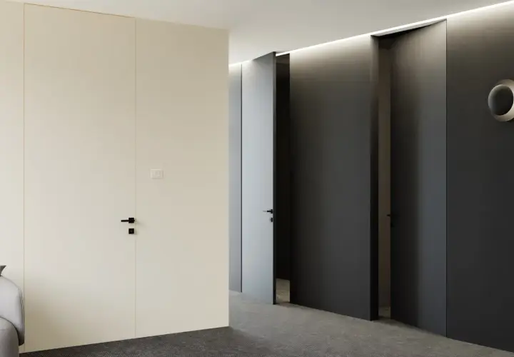 Nowoczesny korytarz z drzwiami ukrytymi w ścianie, tworzącymi efekt odwrotnej przylgi. Minimalistyczne wnętrze z subtelnym oświetleniem.