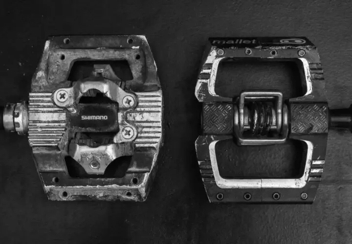 Shimano SPD pedal vs. Crank Brothers Mallet pedal, a classic showdown for mountain bikers.