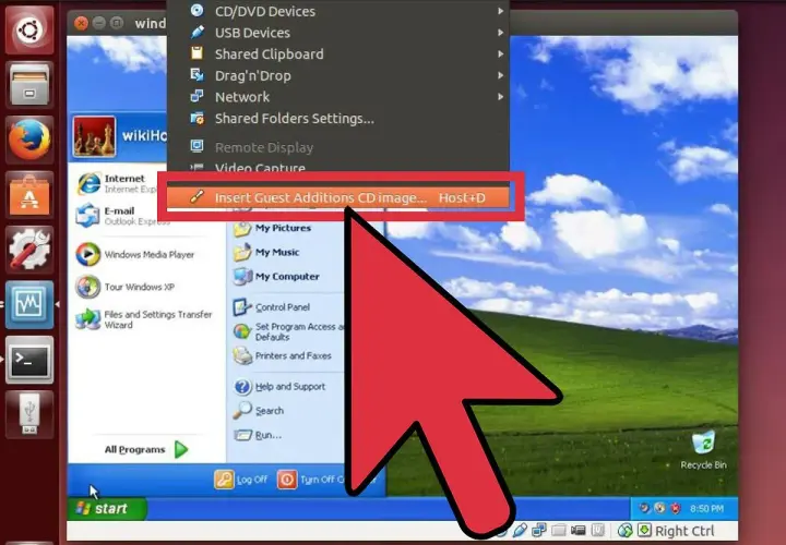 Wirtualna maszyna VirtualBox z systemem Windows XP. Kliknięcie "Insert Guest Additions CD image..." jest kluczowe.