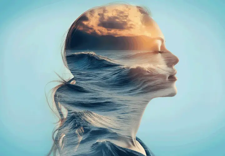 Onda di mare e cielo al tramonto si fondono nel profilo di una donna, un'immagine che evoca il sentimento di quando mi viene l'ansia senza motivo.