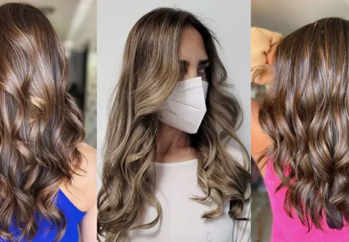 Cabello castaño con mechas mousy hair, ondas suaves y brillo natural.