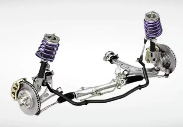 Sistema de suspensión automotriz con amortiguadores morados, frenos de disco y una barra estabilizadora negra que conecta ambos lados.