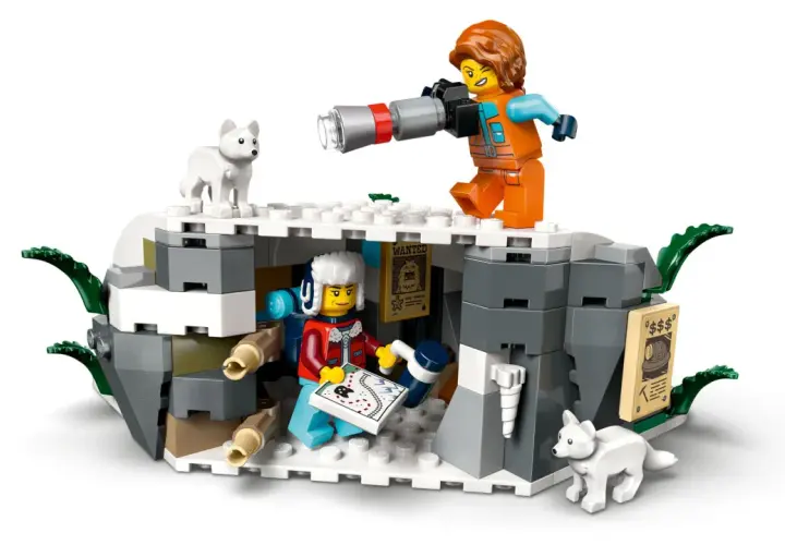 Lego Arktis Polarexpress: Forscherin mit Fernglas und Karte, zwei weiße Wölfe in eisiger Höhle.