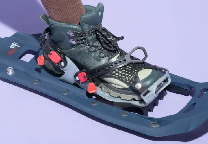 A boot is attached to a snowshoe. You do not need special boots for snowshoes; hiking boots work well.
