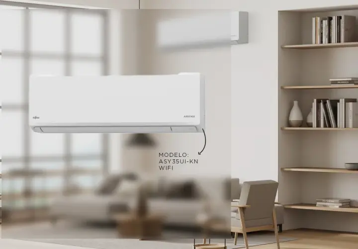 Un aire acondicionado split Fujitsu AIRSTAGE, uno de los tipos de aire acondicionado, modelo ASY35UI-KN con WiFi, en un salón moderno.