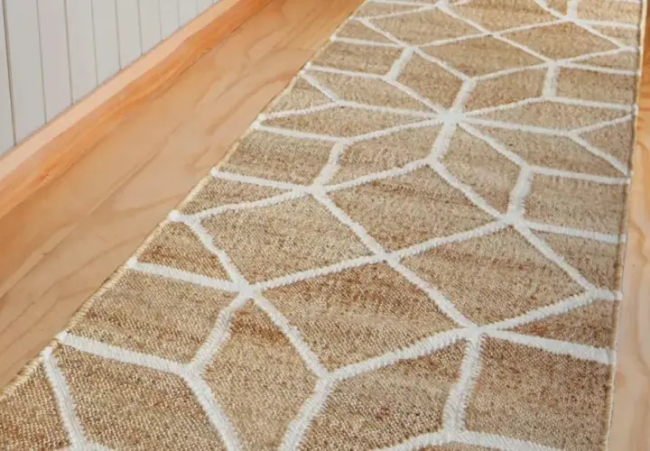 A natural fiber hallway runner with a geometric pattern. This image prompts the question: how long should a hallway runner be to perfectly fit your space?