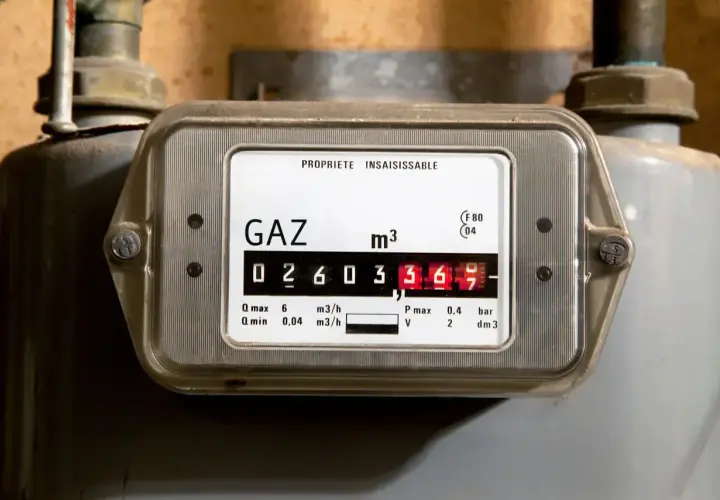 Gazomierz z widocznym odczytem 02603369 m³. Pokazuje zużycie gazu, kluczowe dla obliczenia współczynnika konwersji gazu.
