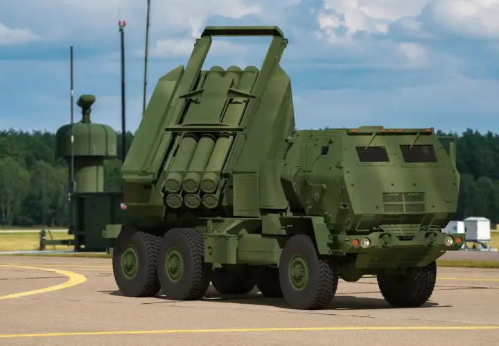 M142 HIMARS, potężna wyrzutnia rakietowa, gotowa do akcji na lotnisku.
