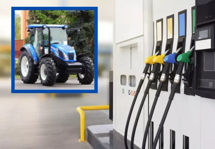 Niebieski traktor czeka na tankowanie. Czy akcyza na paliwo wpłynie na jego pracę?
