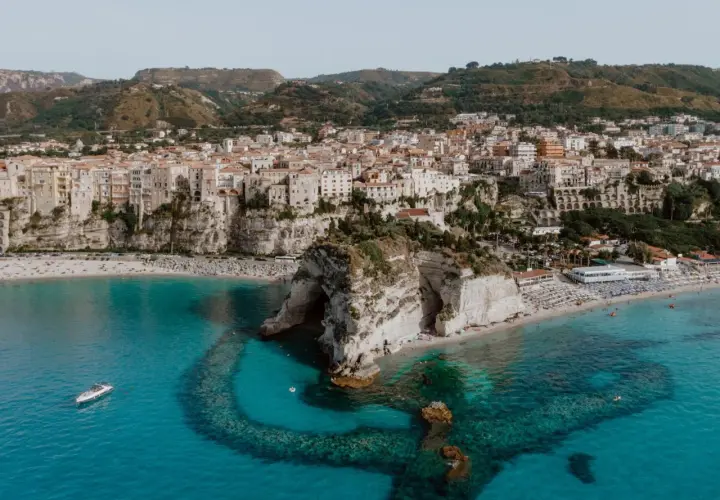 Tropea's stunning cliffs, beaches, and turquoise waters offer many things to do, from sunbathing to exploring the iconic rock formations.