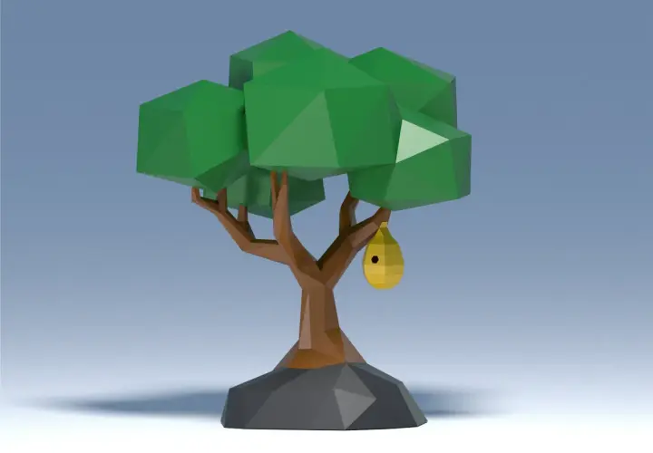 Un árbol de arbol manualidades 3d con un nido amarillo colgando de una rama.